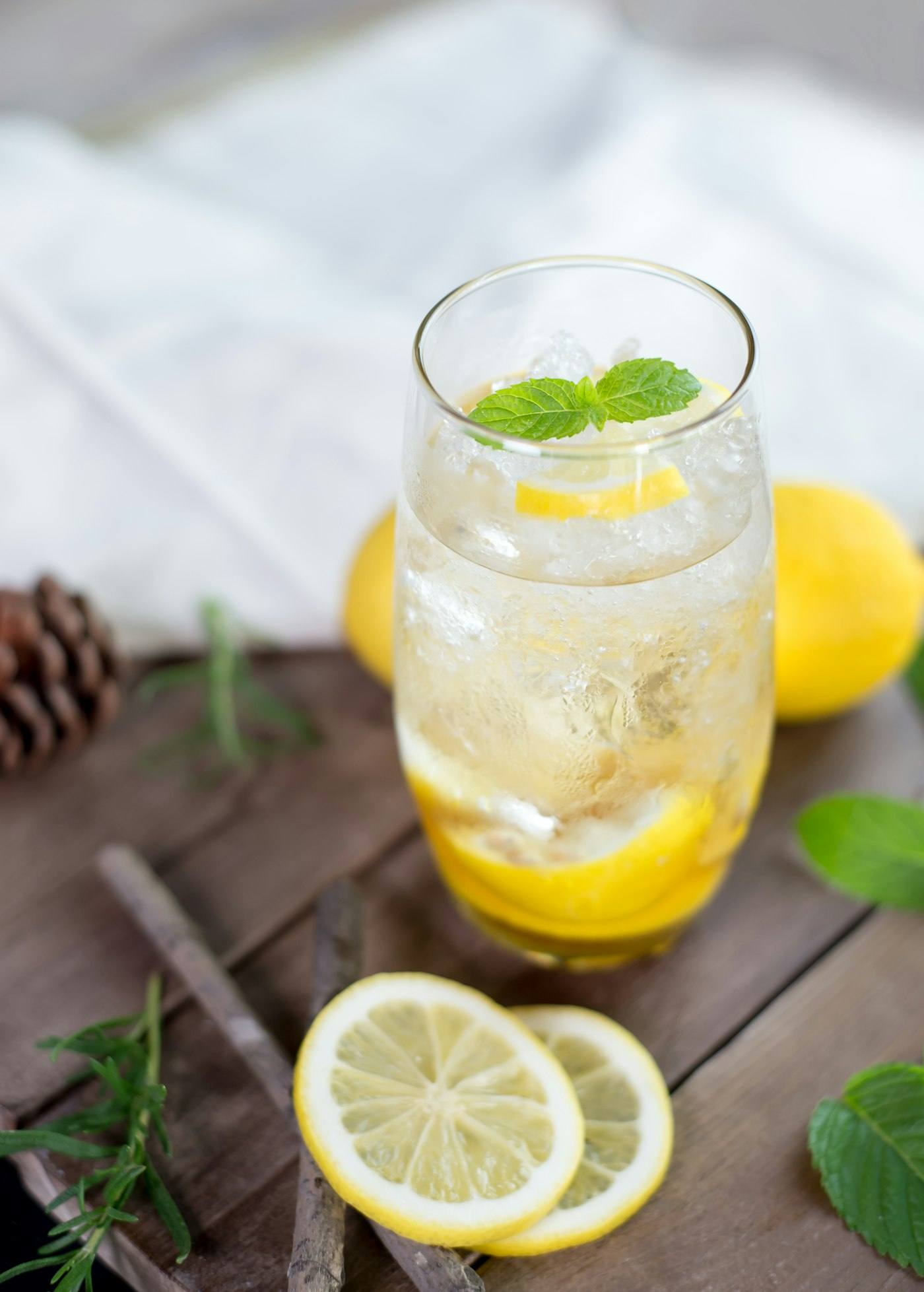 A glass of water with lemon